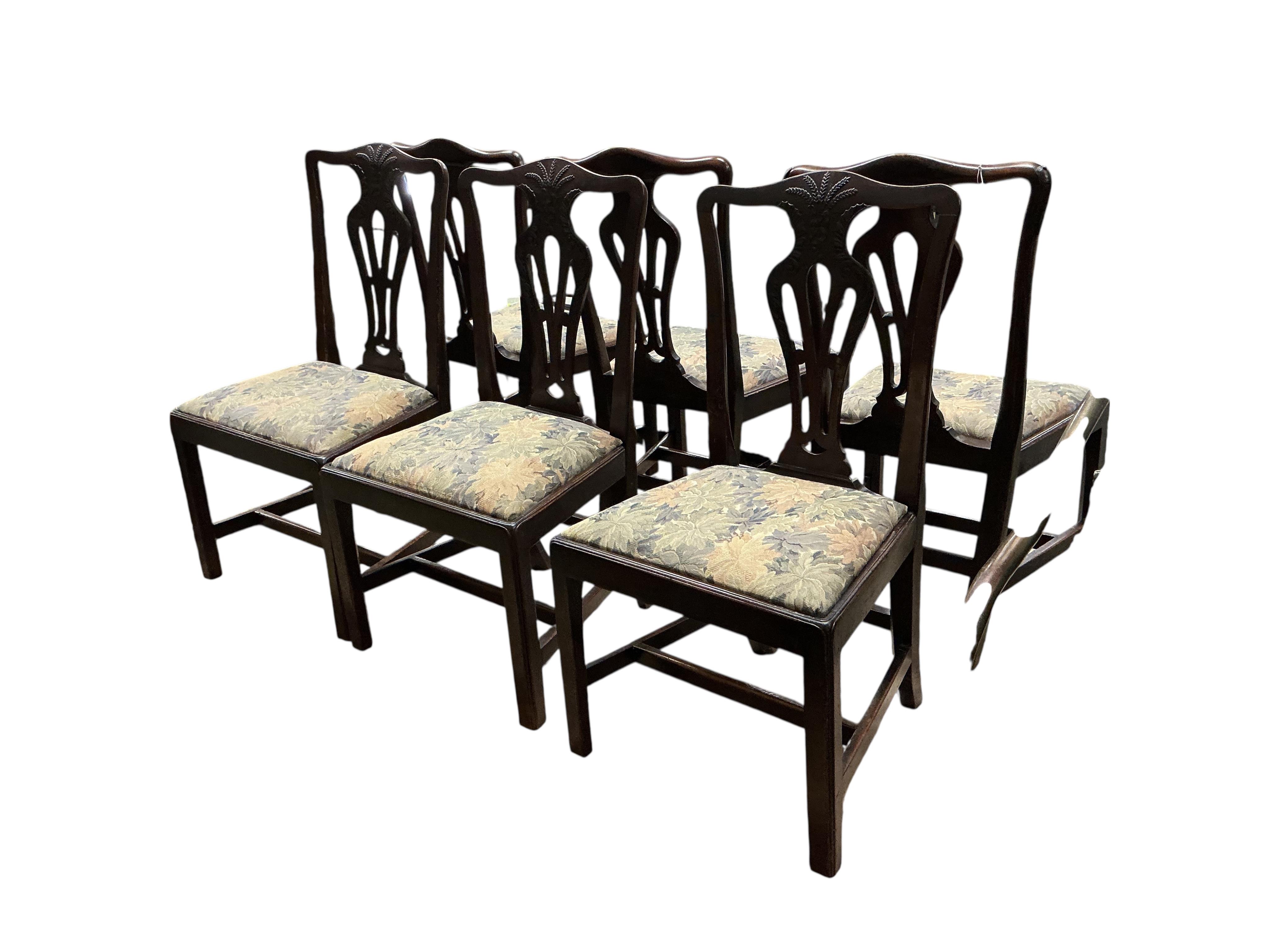 A set of six George III mahogany dining chairs